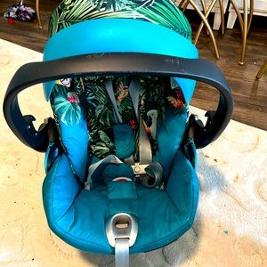 DJ Khalid baby car seat. Used with seen stretches on the handle area.
